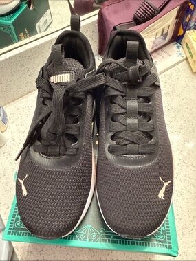 Puma Ladies Black Athletic Sneakers with Pink Accents